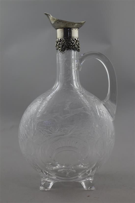 An Edwardian silver mounted rock crystal glass claret jug, c.1904, 24.5cm, crizzling